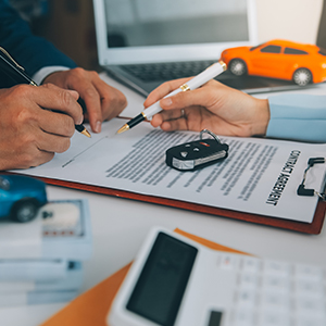 Young physiotherapist exercises in a bright medical office with his injured patient